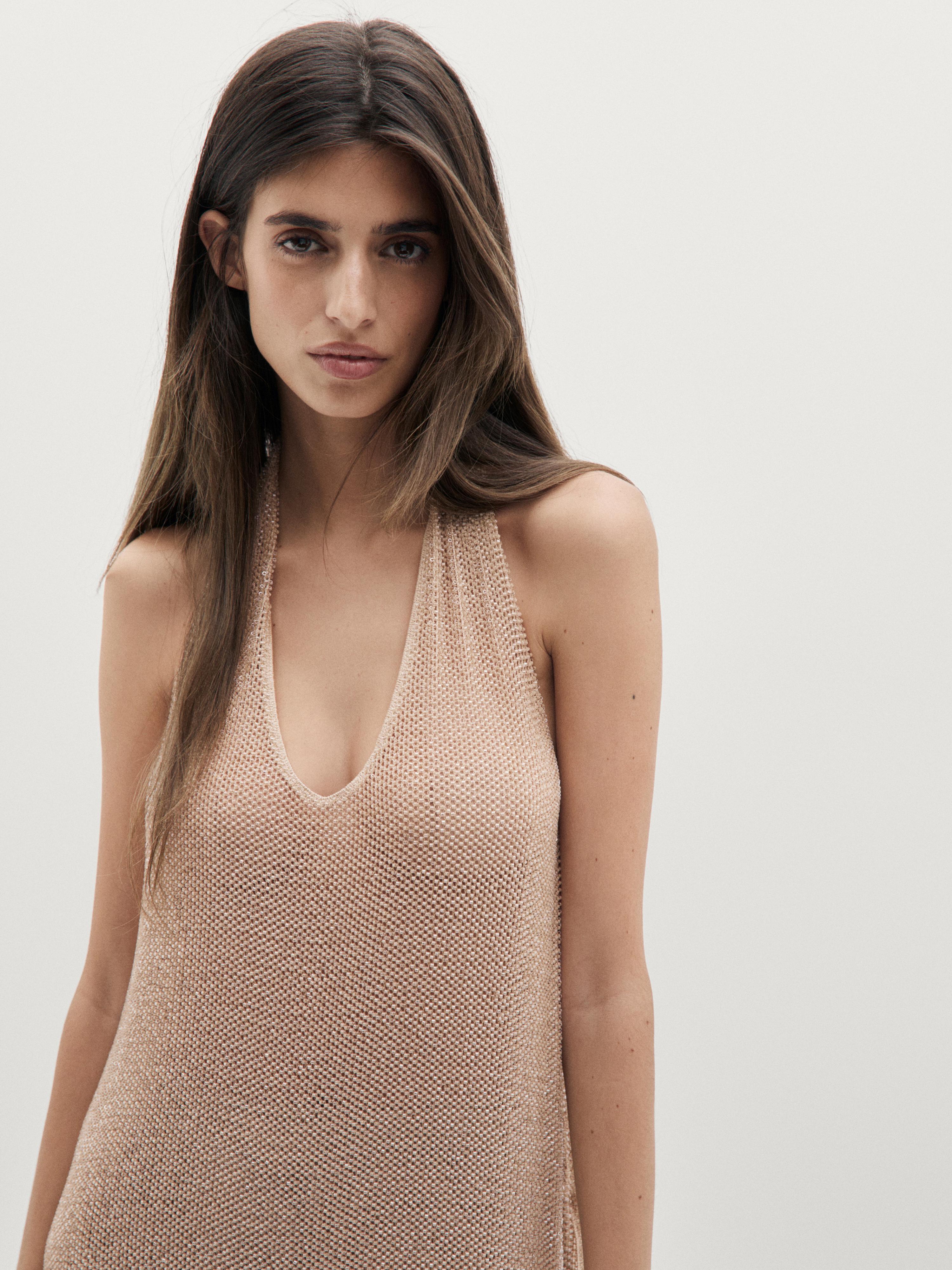 Top en maille brillante à encolure américaine